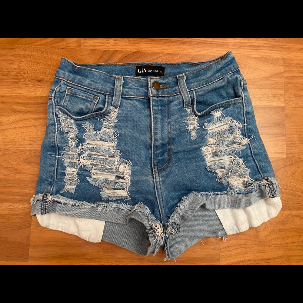 Distressed high waisted blue denim shorts